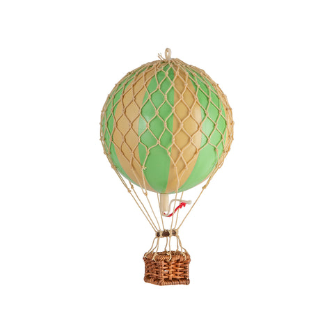 A Wonderen Extra Small Hot Air Balloon - Floating The Skies, adorned in green and brown colors, gracefully floats against a serene white background.