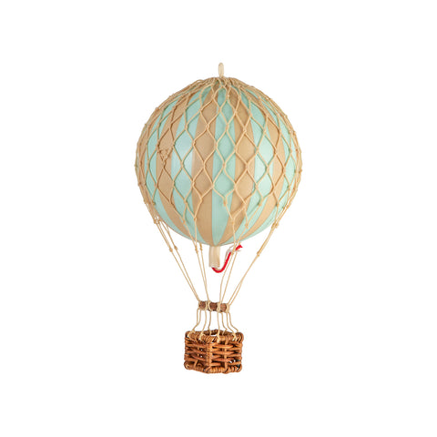 Embark on a whimsical journey aboard a Wonderen Extra Small Hot Air Balloon - Floating The Skies, with a basket on it, and experience the enchantment of a magical adventure brought to you by Wonderen Stroopwafels.