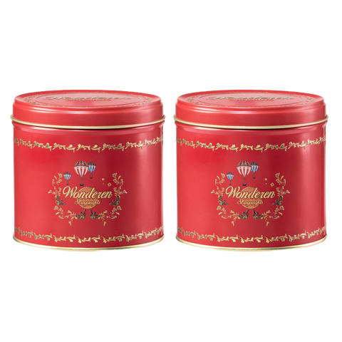 Two Double Authentic Red Stroopwafel Tin Cans with red ribbons on them.